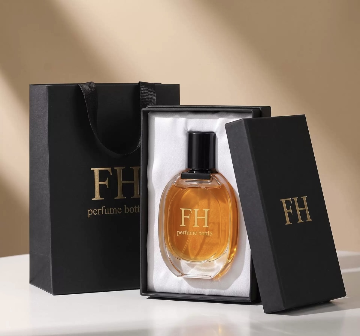 Black perfume gift box, fitted insert, and matching shopping bag